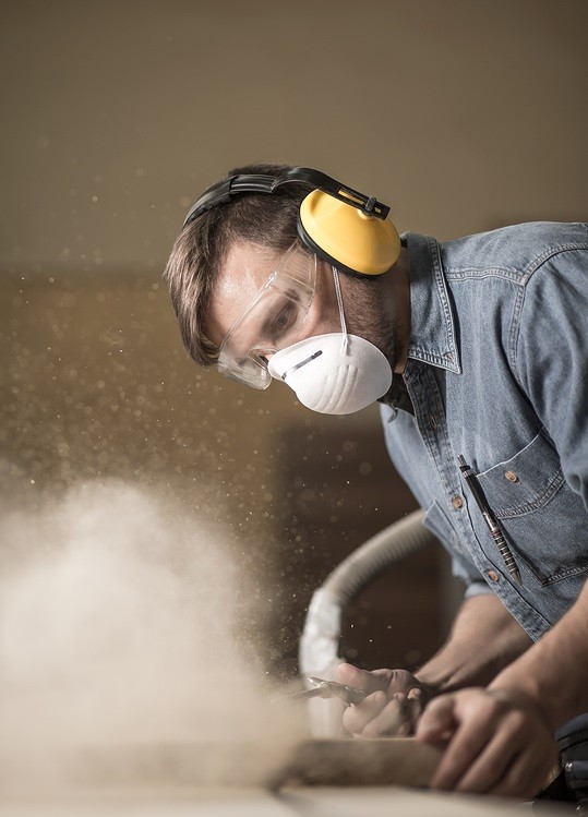 Worker Using Dust Mask